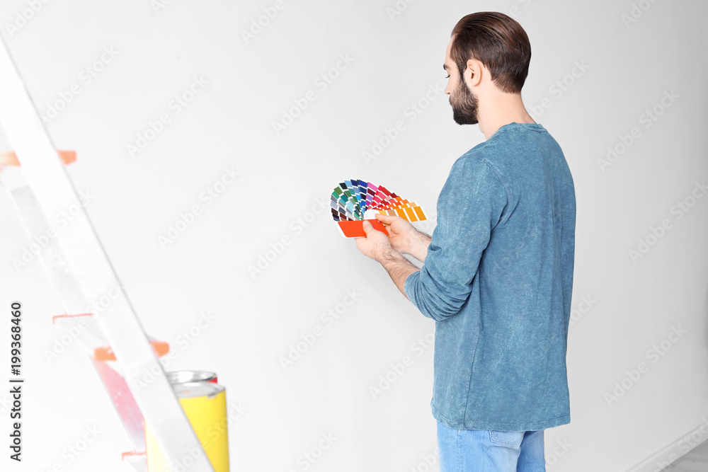 Sticker Young man with color palette on white background