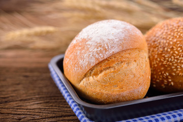 sour dough bread in pan on wooden background