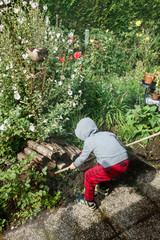 Fototapeta premium Boy playing at garden