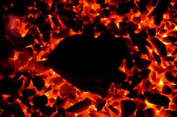 
A large piece of coal, like a heart.
