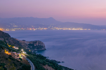 Twilight seascape in the color of the sunset.