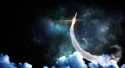 Obraz na płótnie Canvas Rocket in open space. Mixed media