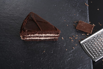 cake prague chocolate dessert on stone background black
