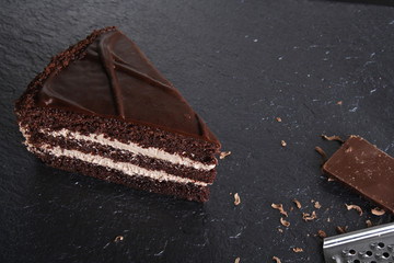 cake prague chocolate dessert on stone background black