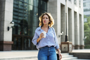 Business woman with a cup of coffee