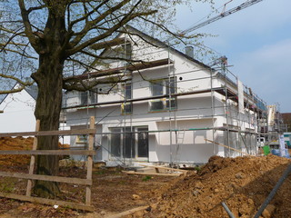 new house building with scaffold german