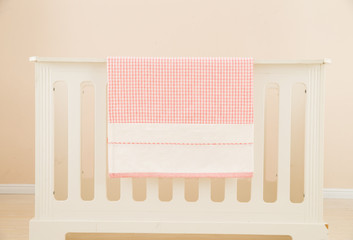 the image of parenting and baby girl crib