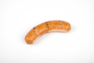 Grilled sausages isolated on a white background