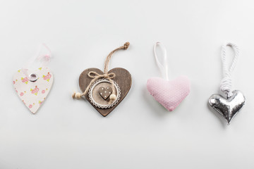 Different decorative hearts on white background