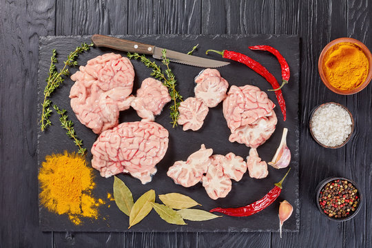 raw brain slices on stone plate