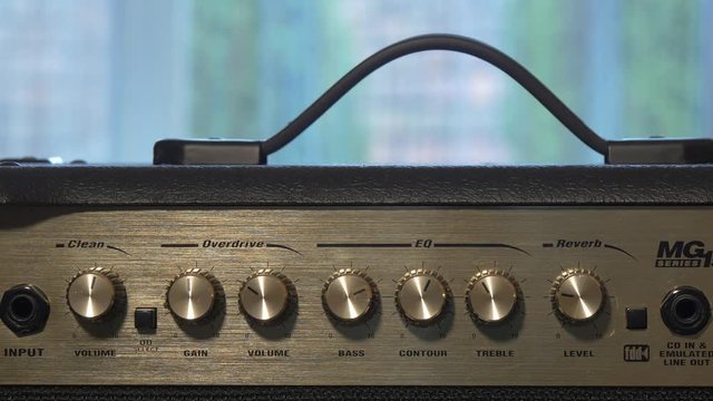 Adjusting volume knobs 