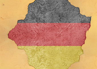 Flag of Germany in big broken material concrete cracked hole facade structure