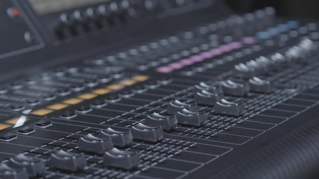 Sound mixer in a music studio