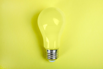 One yellow incandescent lamp