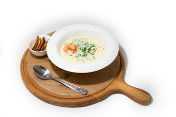 Soup Cream shrimp on a White Plate on a Tree white background