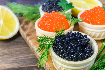 Festive sandwiches with red and black caviar. Healthy and tasty food.