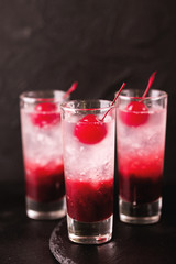 Fototapeta na wymiar Alcoholic cocktail sour cherry gin or porch crawler