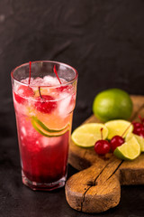 Alcoholic cocktail sour cherry gin or porch crawler. Lemonade.