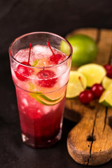 Alcoholic cocktail sour cherry gin or porch crawler. Lemonade.