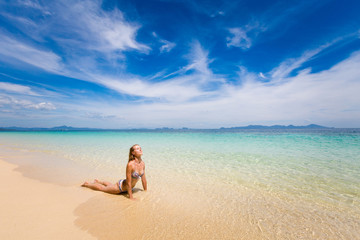 Fototapeta na wymiar Yoga on tropical thai beach