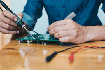 Technician repair circuit board,Use soldering equipment on circuit boards,Repair damaged boards for reuse.