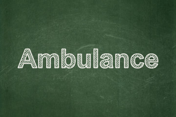 Obraz premium Healthcare concept: text Ambulance on Green chalkboard background