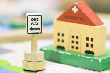 Hospital Wooden Toy Set and One way Signs Play set Educational toys for preschool indoor playground (selective focus)