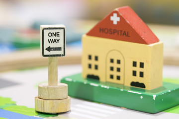 Hospital Wooden Toy Set and One way Signs Play set Educational toys for preschool indoor playground (selective focus)