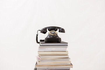 A retro phone on the book