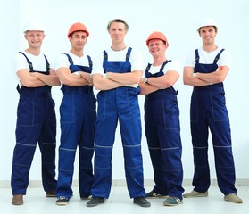team of professional builders in helmets