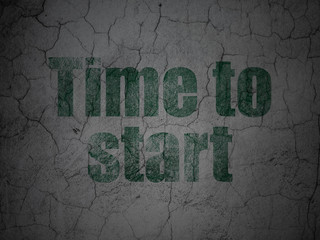 Timeline concept: Green Time to Start on grunge textured concrete wall background