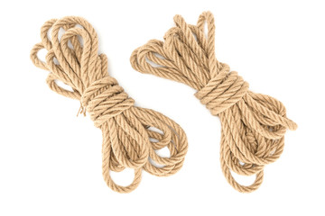 top view of arranged tied nautical ropes isolated on white