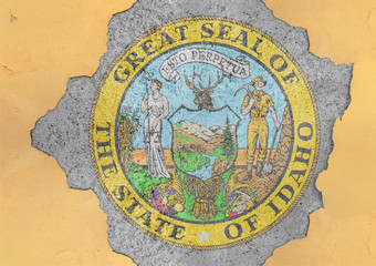 Flag of US state Idaho seal in big broken material concrete hole facade structure