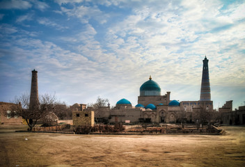 Exterior view to Mausoleum of Pahlavon Mahmoud, Juma mosque and Khoja minor minaret at Itchan Kala, Khiva, Uzbekistan