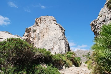 Rocks line the trail through the Boquer valley in the Serra de Tramuntana mountains on the Spanish island of Majorca. Starting at Puerto Pollensa, the 3.5km trail ends at the beach of Cala Boquer.
