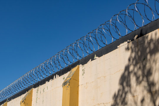 Old Prison Walls With Wire 