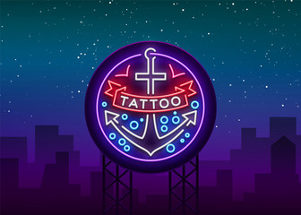 Fototapeta premium Tattoo salon logo in a neon style. Neon sign, emblem, anchor symbol with a ribbon, luminous billboard, neon advertising on a tattoo theme, for tattoo salon, studio. Vector illustration
