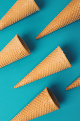 Sweet wafer cone on color background. Top view.
