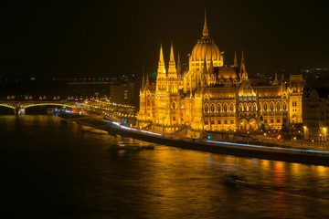 Naklejka na ściany i meble Scenic night scape of Hungarian Parliament Building in Budapest, Hungary.