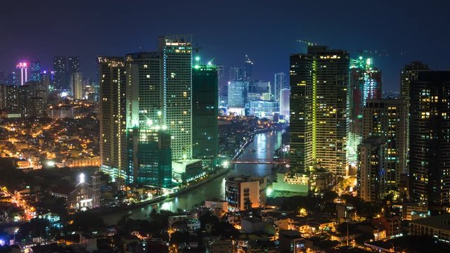 Metro Manila, Philippines, Time Lapse View of Modern Buildings and Pasig River at Night