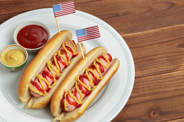 Hot dogs on wooden background