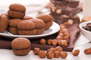 Hazelnut shortbread sandwiches filled with chocolate cream 
