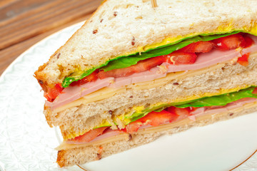 sandwich on a wooden table