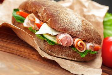 sandwich on a wooden table