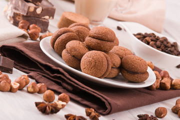 Hazelnut shortbread sandwiches filled with chocolate cream 