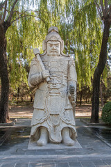 Fototapeta na wymiar Ancient warrior statue on the Ming Tomb Alley in Beijing, (established in 14th century) 
