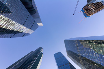 Fototapeta na wymiar Business center skyscrapers. Construction of new buildings. Sky background