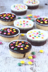 Cupcakes with sugar coated chocolate