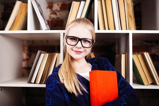 Teenage girl in a library