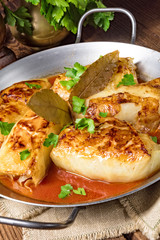 baked cabbage rolls in tomato sauce